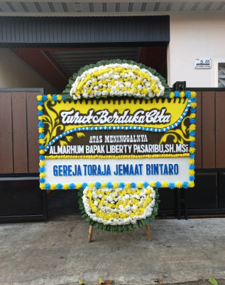 Papan Bunga Duka di Madidir Ure